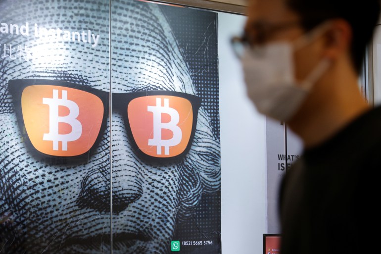 An advertisement for Bitcoin and cryptocurrencies is seen in Hong Kong, China September 27, 2021. REUTERS/Tyrone Siu